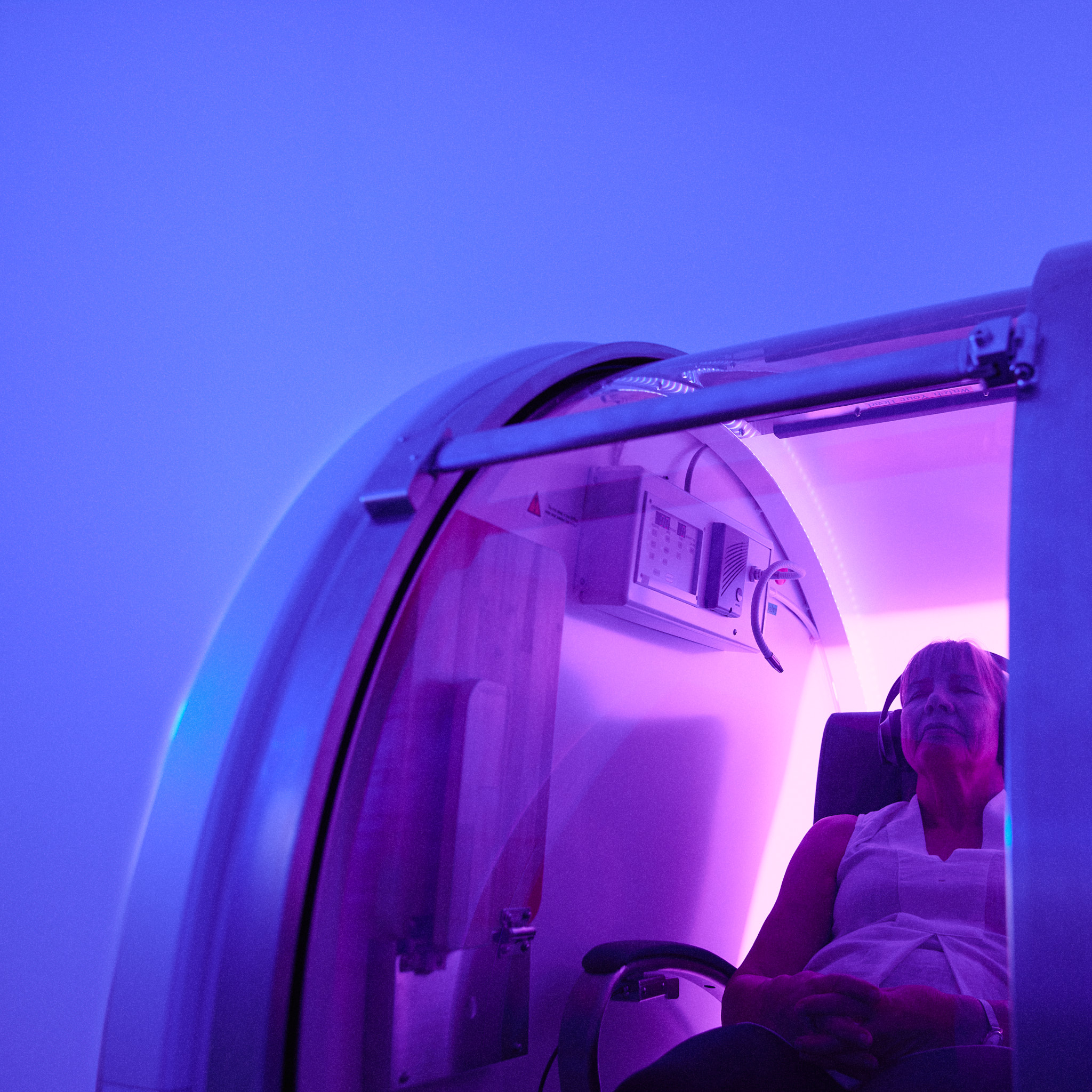 Woman in hyperbaric oxygen chamber at Soma House