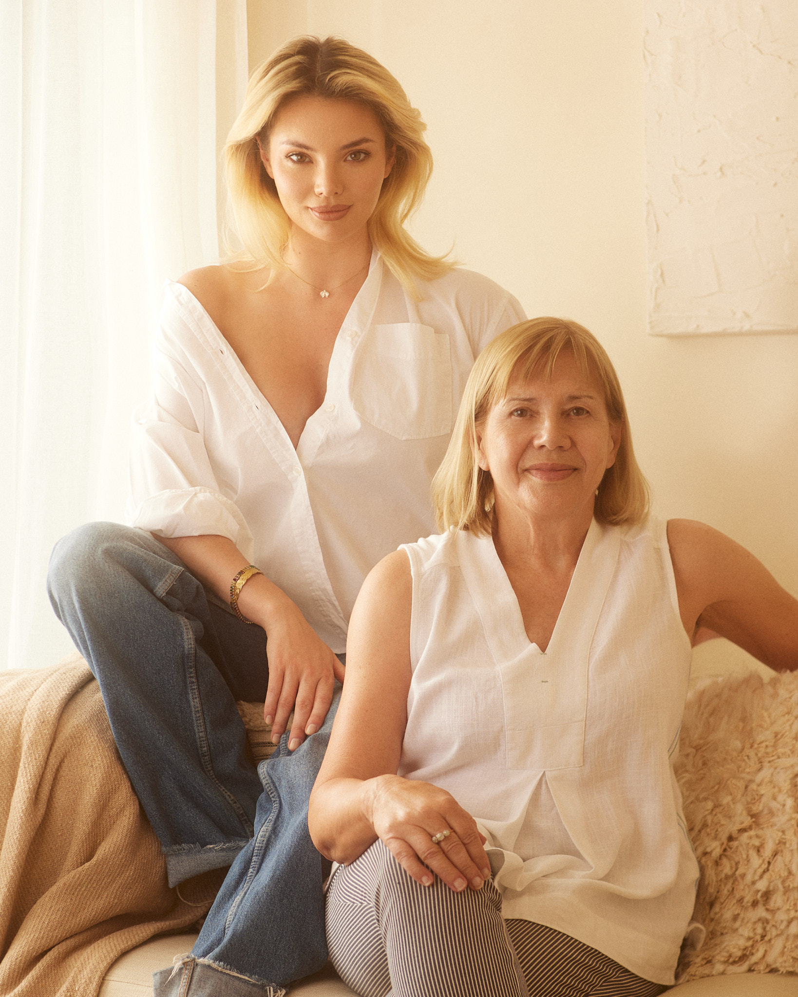 Mother and daughter portrait sat in the waiting area of wellness clinic for cryotherapy, hyperbaric oxygen therapy and compression therapy