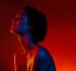 women bathed in red light, portraying red light therapy at soma house