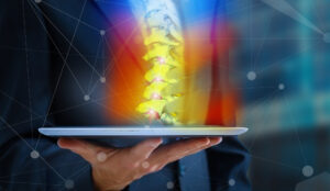 ipad showing images of bones to o represent bone density scanning at soma house in high Wycombe